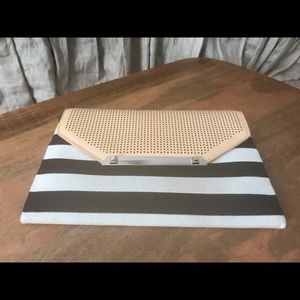 Stella & Dot striped clutch.  Never used.
